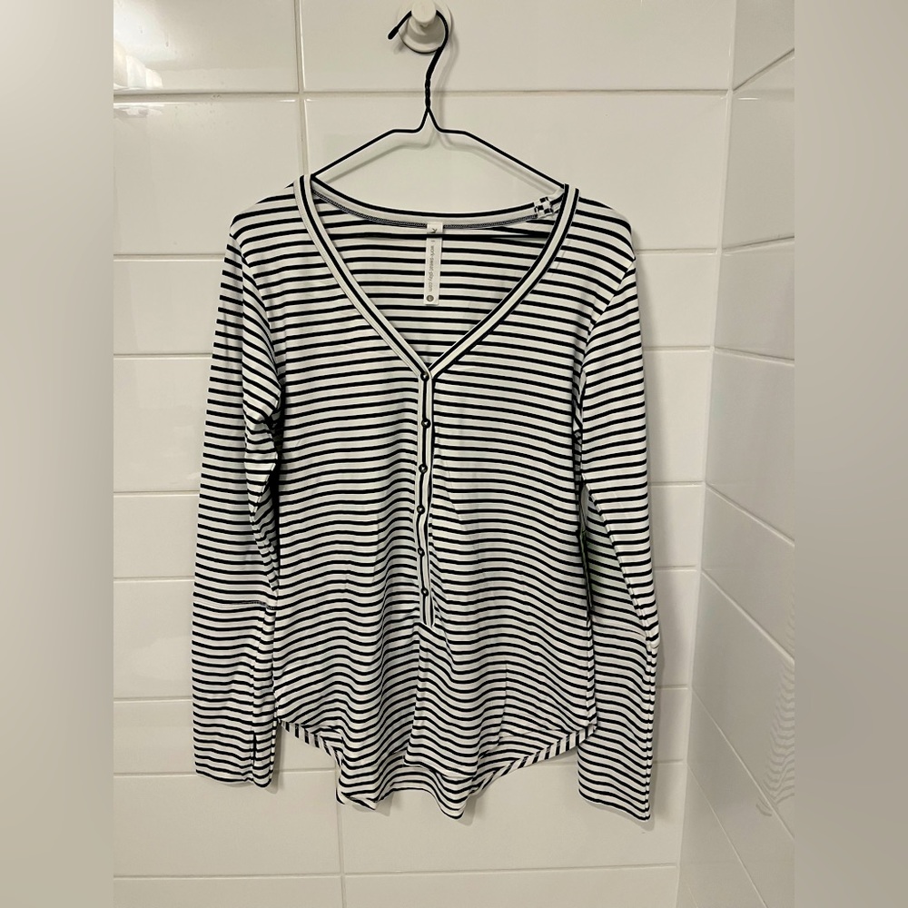 NWT 4 way stretch Blue and White striped athletic top.